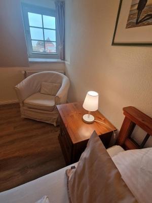 Inselhotel Kapitaen Tadsen / Amrum Nebel Rom bilde
